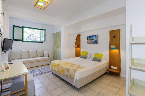 Posteľ alebo postele v izbe v ubytovaní Villa Armonia Sithonia