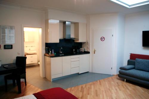 Η κουζίνα ή μικρή κουζίνα στο La Scala Apartments
