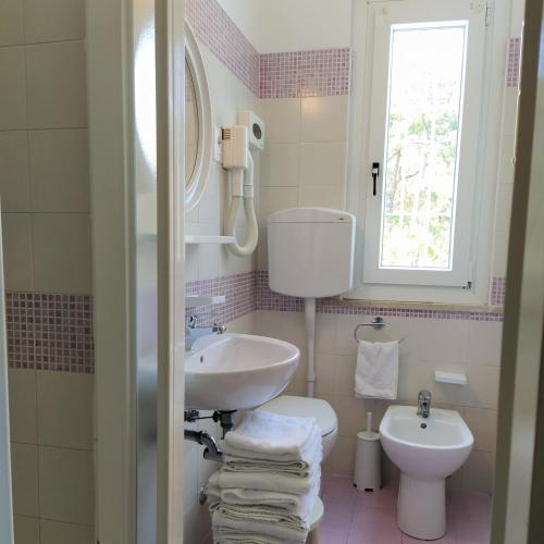 Koupelna v ubytování Hotel Capri