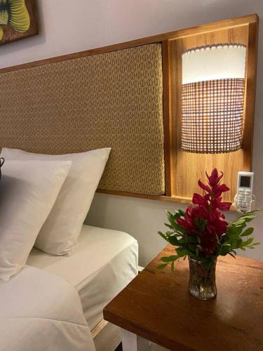 Postel nebo postele na pokoji v ubytování Hotel Via dos Corais