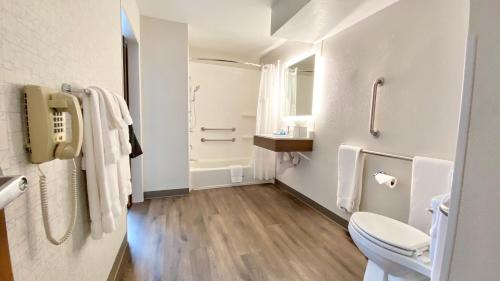 a bathroom with a toilet and a sink at Holiday Inn Express Park City, an IHG Hotel in Park City