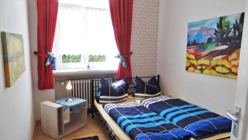 Ein Bett oder Betten in einem Zimmer der Unterkunft Nussdorfer Hof