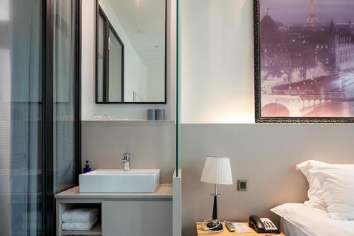 Postel nebo postele na pokoji v ubytování Wifi Boutique Hotel