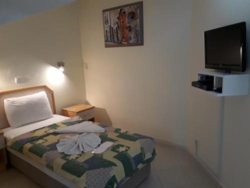 Postel nebo postele na pokoji v ubytování Hotel NilSu