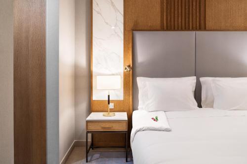 En eller flere senge i et værelse på Wyndham Grand Algarve