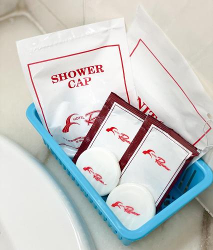 a box of white balls with a shower car sign at Hotel Rainbow in Cameron Highlands