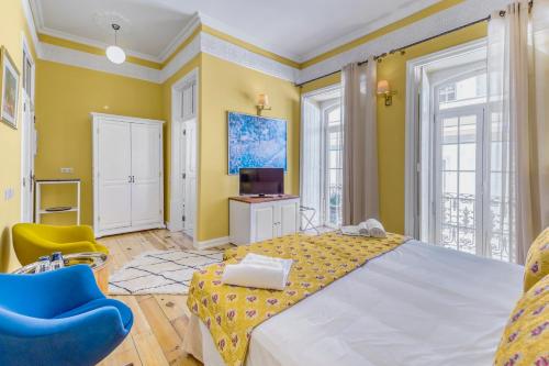 Ένα ή περισσότερα κρεβάτια σε δωμάτιο στο Mosaiko 5 Suites