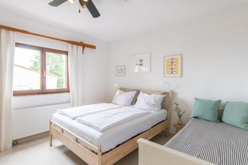 Postel nebo postele na pokoji v ubytování Apartments Makii