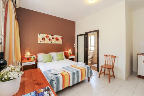 Postel nebo postele na pokoji v ubytování Mariblu Hotel