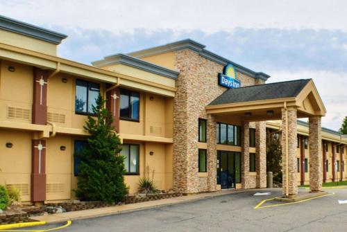 a hotel with a sign on the front of it at Days Inn by Wyndham Wayne in Wayne