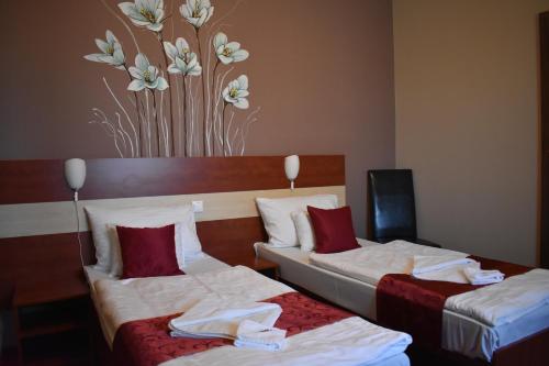 Cama o camas de una habitación en Libra Hotel