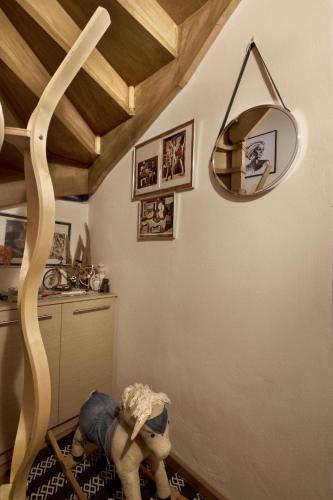 a teddy bear laying on the floor in a room at Chronis Family Villas in Krousón