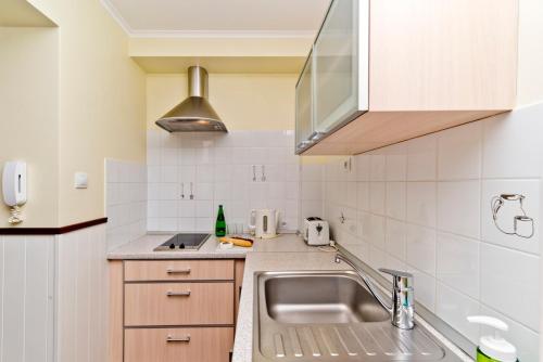 Kuchyňa alebo kuchynka v ubytovaní Apartamenty.in Villa Baltic