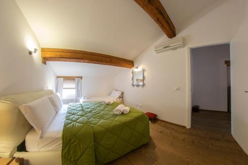 Marconi Rooms Alloggio Segretoにあるベッド