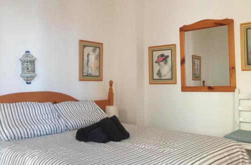 Ένα ή περισσότερα κρεβάτια σε δωμάτιο στο Vacacional playa Las Galletas