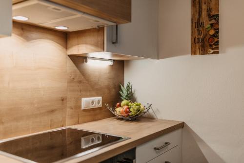 Η κουζίνα ή μικρή κουζίνα στο DAS "Bergzeit" - Appartements