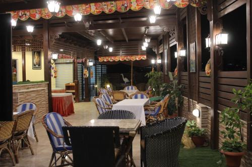 Restaurant o un lloc per menjar a Amin Hotel