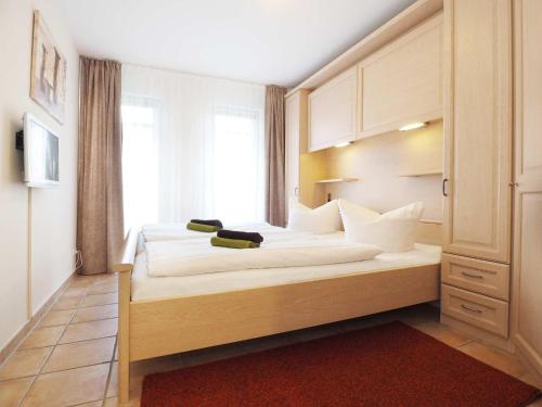 Postel nebo postele na pokoji v ubytování Residenz Bleichroeder Wohnung 30