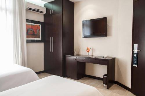 TV o dispositivi per l'intrattenimento presso HR Luxor Hotel Buenos Aires