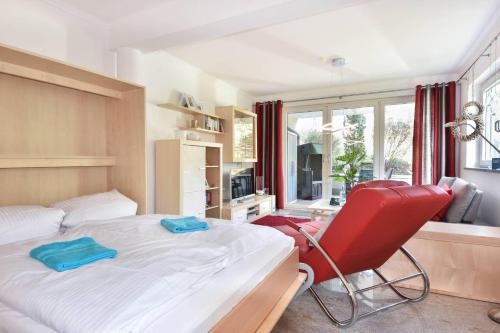 Postel nebo postele na pokoji v ubytování Villa Marfa Wohnung 13