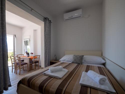 Posteľ alebo postele v izbe v ubytovaní Apartments Tri Mora