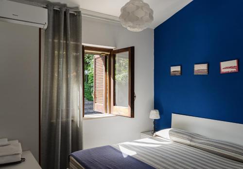 Ein Bett oder Betten in einem Zimmer der Unterkunft Casa vacanze Artemide
