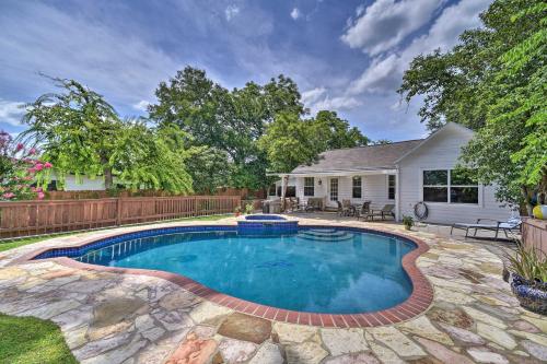a swimming pool in the backyard of a house at San Antonio House with Private Pool, Spa and Grill in San Antonio