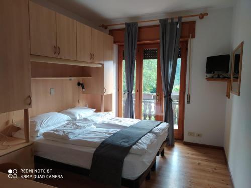 Cama o camas de una habitación en Sporting Hotel Club