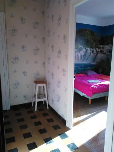 Ένα ή περισσότερα κρεβάτια σε δωμάτιο στο Appartements Proche du centre