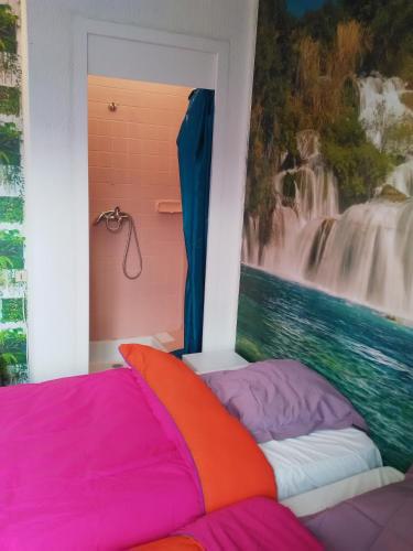 Ένα ή περισσότερα κρεβάτια σε δωμάτιο στο Appartements Proche du centre