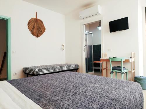 Ένα ή περισσότερα κρεβάτια σε δωμάτιο στο Lo Spicchio b&b