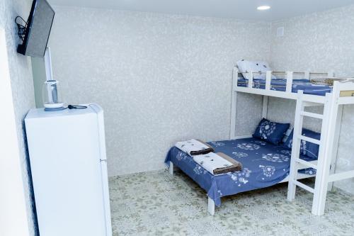 Postel nebo postele na pokoji v ubytování Эдем 3