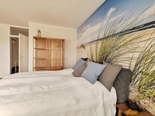 Een bed of bedden in een kamer bij Ferienwohnung Ebbe & Flut