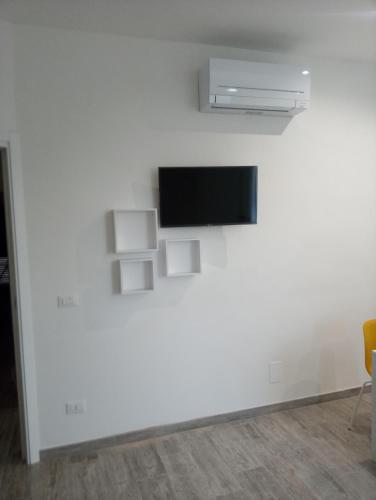 TV a/nebo společenská místnost v ubytování Casa vacanze Tre stelle