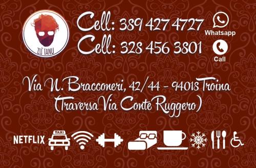 a poster for a coffee shop with avertisement at B&B al centro storico in Troina