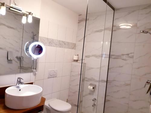 Koupelna v ubytování Hotel Via Roma