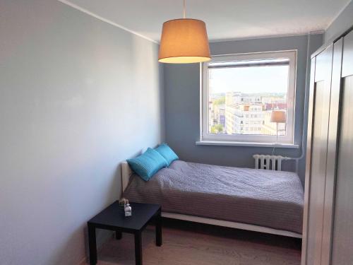 Postel nebo postele na pokoji v ubytování Avis Apartments - City Gdynia 38