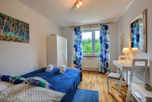 Posteľ alebo postele v izbe v ubytovaní Apartamenty BIESZCZADZKI Anioł