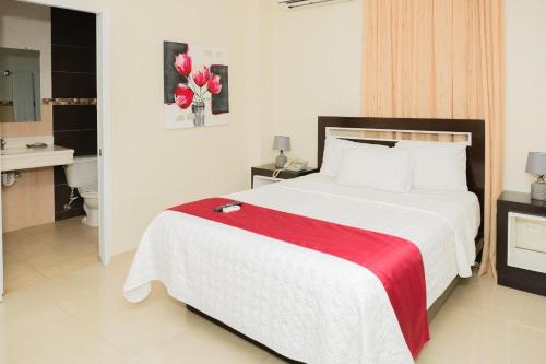 Ένα ή περισσότερα κρεβάτια σε δωμάτιο στο Hostal San Francisco de Asis