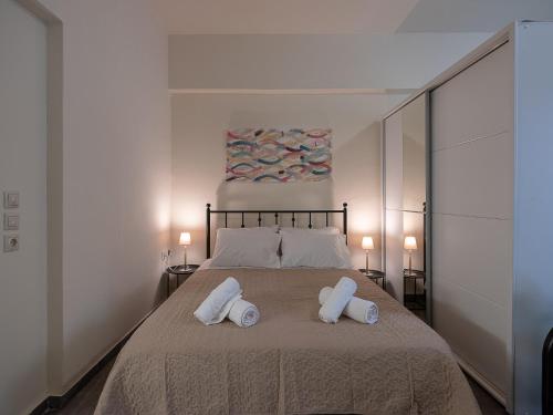 Llit o llits en una habitació de Luxury Apts Heraklion Center