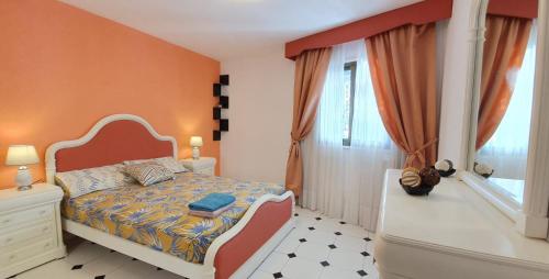 Letto o letti in una camera di Encantadora vivienda en el paseo marítimo de Salou