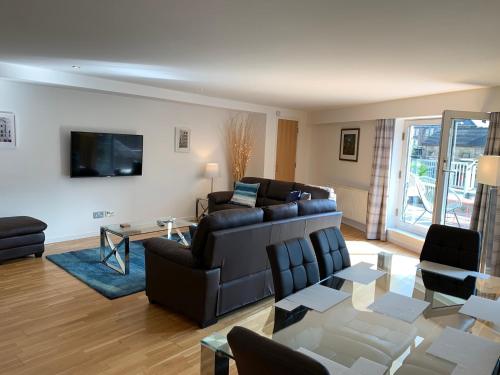 Televisyen dan/atau pusat hiburan di Tolbooth Apartments by Principal Apartments