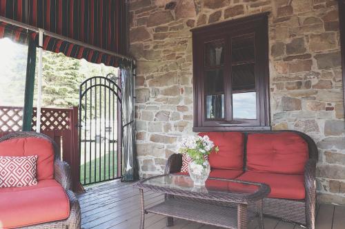 Posezení v ubytování Domaine Steinbach Cidrerie B&B Distillerie