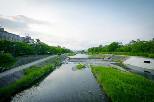 a view of a river from a bridge at Riverte Kyoto Kamogawa in Kyoto