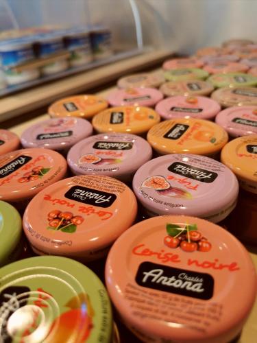 a bunch of different colored labels on a display at Maison San Giovanni in Corte