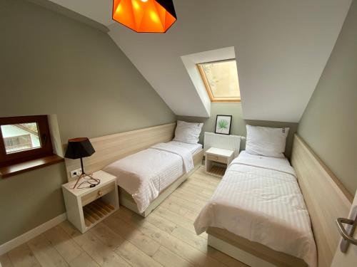 Posteľ alebo postele v izbe v ubytovaní B&B ALIBI