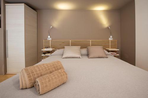 A bed or beds in a room at MiniLoft25