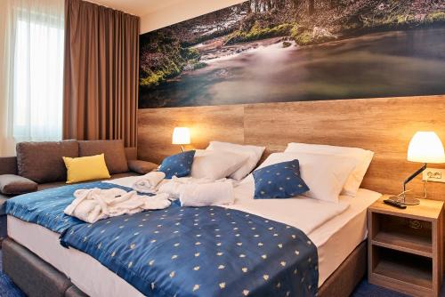 Säng eller sängar i ett rum på Hotel Europa