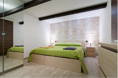 Postel nebo postele na pokoji v ubytování Casa della Dogana