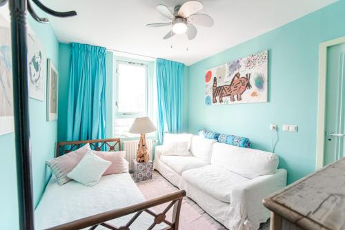 Ένα ή περισσότερα κρεβάτια σε δωμάτιο στο Beach Suite Sand
